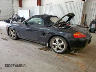 1999 Porsche Boxster z VIN WP0CA2988XU623383, wystawiony jako Copart lot #60567895 z przebiegiem Nie podano mil oraz Czysty tytuł • Clean title. Historia ofert i sprzedaży dostępna na DreamBid. Obrazek 2.