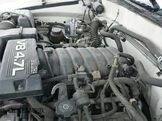 2005 Toyota Tundra Work Truck with VIN 5TBJT321X5S460086, listed as a IAAI auction lot 41381212 with 235,596 mi miles and . Bid and sale history available at DreamBid. Image 12.