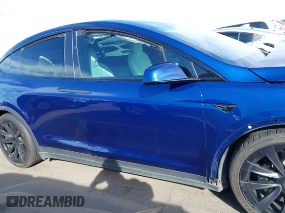 2022 Tesla Model X with VIN 7SAXCDE58NF341112, listed as a IAAI auction lot 41632491 with Not Provided miles and . Bid and sale history available at DreamBid. Image 13.