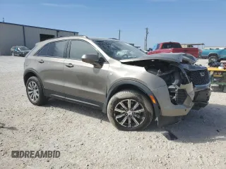 2020 Cadillac XT4 FWD Sport z VIN 1GYFZER40LF134537, wystawiony jako Copart lot #48219045 z przebiegiem 77 307 mil mil oraz Szkoda całkowita • Salvage title. Historia ofert i sprzedaży dostępna na DreamBid. Obrazek 4.