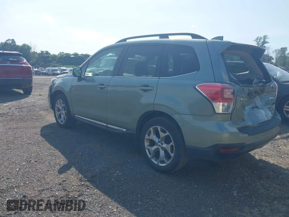 2017 Subaru Forester Touring with VIN JF2SJAWC8HH579492, listed as a IAAI auction lot 42571986 with 57,228 mi miles and . Bid and sale history available at DreamBid. Image 3.