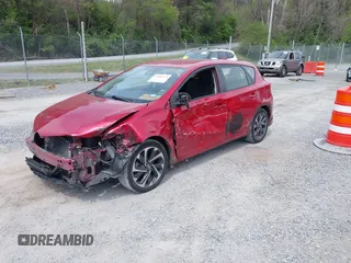 2018 Toyota Corolla iM with VIN JTNKARJE7JJ573943, listed as a IAAI auction lot 42080333 with 99,860 mi miles. Bid and sale history available at carsss.com. Image 2.