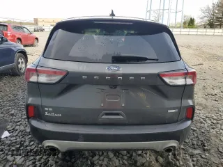 2020 Ford Escape SE z VIN 1FMCU9G65LUA04361, wystawiony jako Copart lot #53974145 z przebiegiem 78 305 mil mil oraz Szkoda całkowita • Salvage title. Historia ofert i sprzedaży dostępna na DreamBid. Obrazek 6.