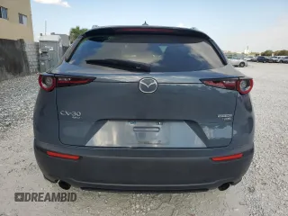 2021 Mazda CX-30 Premium with VIN 3MVDMBDY2MM306250, listed as a Copart auction lot 53430615 with 59,112 mi miles and Salvage title. Bid and sale history available at DreamBid. Image 6.