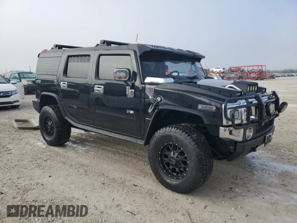 2003 Hummer H2 with VIN 5GRGN23U33H148965, listed as a Copart auction lot 78187534 with 23,202 mi miles and Non Repairable. Bid and sale history available at carsss.com. Image 4.