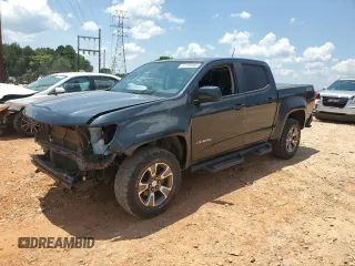 2018 Chevrolet Colorado 4WD Z71 with VIN 1GCGTDEN7J1110282, listed as a Copart auction lot 61945695 with 144,792 mi miles and Salvage title. Bid and sale history available at DreamBid. Image 1.