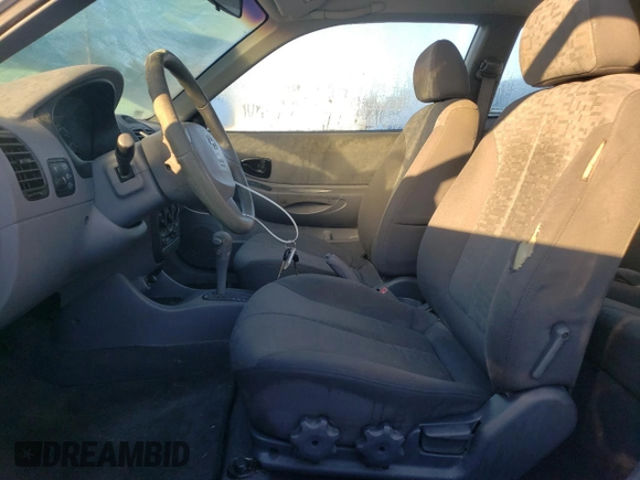 2004 Hyundai Accent GL with VIN KMHCG35C44U284868, listed as a Copart auction lot 74054884 with 87,259 mi miles and Clean Title. Bid and sale history available at carsss.com. Image 7.