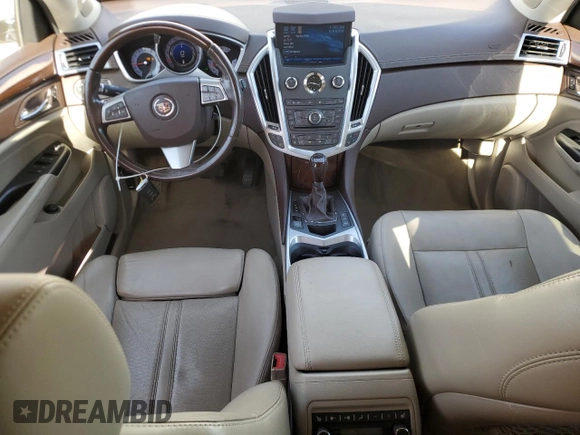 2012 Cadillac SRX Premium Collection с VIN 3GYFNFE30CS534835, выставлен на аукционе Copart как лот 63681235 с пробегом 124 964 миль миль и Списание • Salvage title. История ставок и продаж доступна на DreamBid. Изображение 8.