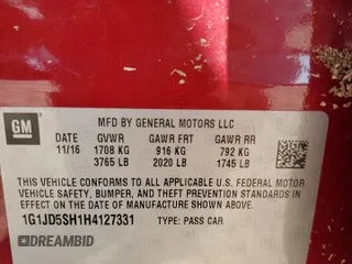 2017 Chevrolet Sonic LT z VIN 1G1JD5SH1H4127331, wystawiony jako Copart lot #52709905 z przebiegiem 73 810 mil mil oraz Szkoda całkowita • Salvage title. Historia ofert i sprzedaży dostępna na DreamBid. Obrazek 13.