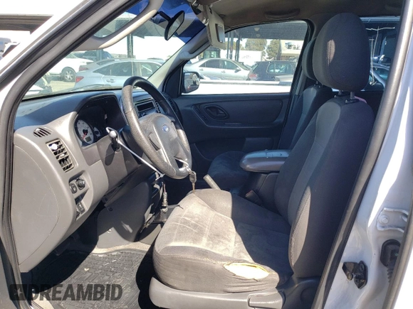 2004 Ford Escape XLS with VIN 1FMYU02184DA20455, listed as a Copart auction lot 73806544 with 322,565 mi miles and Clean Title. Bid and sale history available at DreamBid. Image 7.