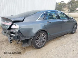 2016 Lincoln MKZ with VIN 3LN6L2G99GR609353, listed as a IAAI auction lot 42106982 with 161,046 mi miles and . Bid and sale history available at DreamBid. Image 4.