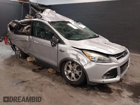 2016 Ford Escape Titanium with VIN 1FMCU9J94GUB00815, listed as a IAAI auction lot 40893687 with 152,891 mi miles. Bid and sale history available at carsss.com. Image 1.