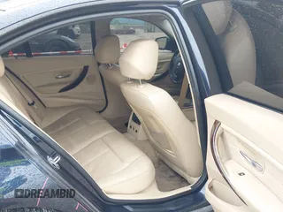 2013 BMW 3 Series 328i xDrive with VIN WBA3B3C50DJ698249, listed as a IAAI auction lot 42303923 with 130,527 mi miles and . Bid and sale history available at DreamBid. Image 8.