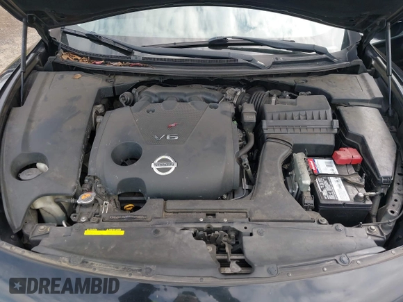 2014 Nissan Maxima S with VIN 1N4AA5AP9EC908498, listed as a IAAI auction lot 41945171 with 130,090 mi miles and . Bid and sale history available at DreamBid. Image 10.