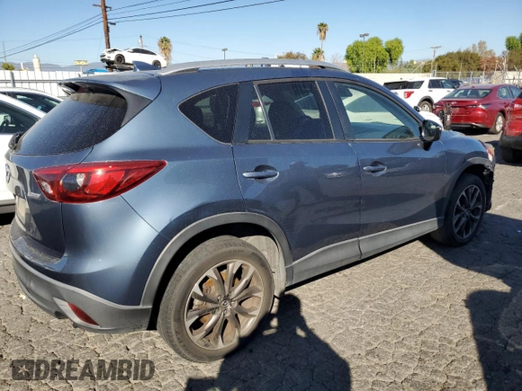 2016 Mazda CX-5 Grand Touring with VIN JM3KE2DY8G0644790, listed as a Copart auction lot 82060424 with 0 mi miles and Clean Title. Bid and sale history available at carsss.com. Image 3.