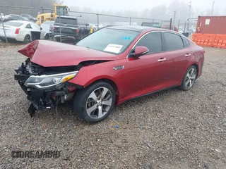 2019 Kia Optima LX with VIN 5XXGT4L32KG360570, listed as a IAAI auction lot 41497880 with 120,744 mi miles. Bid and sale history available at carsss.com. Image 2.