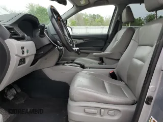 2017 Honda Pilot Touring z VIN 5FNYF6H92HB006855, wystawiony jako Copart lot #53650655 z przebiegiem 130 732 mil mil oraz Szkoda całkowita • Salvage title. Historia ofert i sprzedaży dostępna na DreamBid. Obrazek 7.