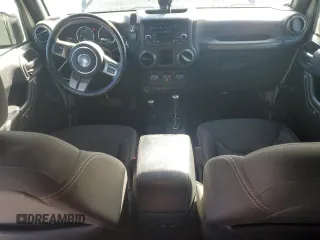 2018 Jeep Wrangler JK Unlimited Sport S with VIN 1C4BJWDG2JL871384, listed as a Copart auction lot 49990495 with 66,770 mi miles and Salvage Title. Bid and sale history available at carsss.com. Image 8.