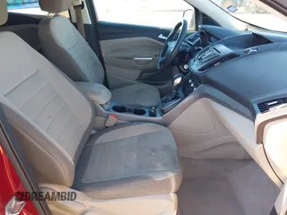 2014 Ford Escape SE z VIN 1FMCU0GX0EUA62000, wystawiony jako IAAI lot #41302259 z przebiegiem 87 659 mil mil oraz . Historia ofert i sprzedaży dostępna na DreamBid. Obrazek 5.