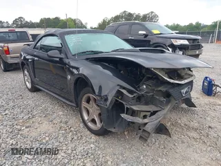 2004 Ford Mustang GT Deluxe z VIN 1FAFP45X64F104911, wystawiony jako IAAI lot #42025366 z przebiegiem 78 686 mil mil oraz . Historia ofert i sprzedaży dostępna na DreamBid. Obrazek 1.