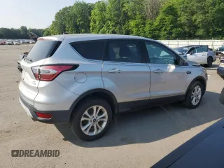 2017 Ford Escape SE z VIN 1FMCU9G99HUF01057, wystawiony jako Copart lot #60351695 z przebiegiem Nie podano mil oraz Czysty tytuł • Clean title. Historia ofert i sprzedaży dostępna na DreamBid. Obrazek 3.