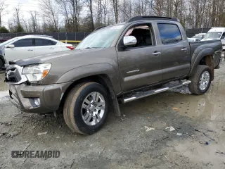 2015 Toyota Tacoma with VIN 3TMLU4EN4FM195426, listed as a Copart auction lot 86599744 with 136,461 mi miles and Salvage Title. Bid and sale history available at carsss.com. Image 1.