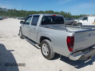 2012 GMC Canyon z VIN 1GCD5MFE3C8107823, wystawiony jako IAAI lot #42146540 z przebiegiem 100 063 mil mil oraz . Historia ofert i sprzedaży dostępna na DreamBid. Obrazek 3.