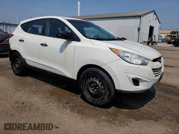 2011 Hyundai Tucson GL with VIN KM8JT3AC4BU166471, listed as a Copart auction lot 59549205 with 309,635 mi miles and Clean title. Bid and sale history available at DreamBid. Image 4.