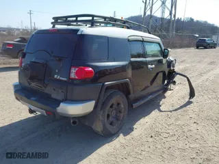 2007 Toyota FJ Cruiser with VIN JTEBU11F370035644, listed as a IAAI auction lot 41698247 with 214,482 mi miles. Bid and sale history available at carsss.com. Image 4.