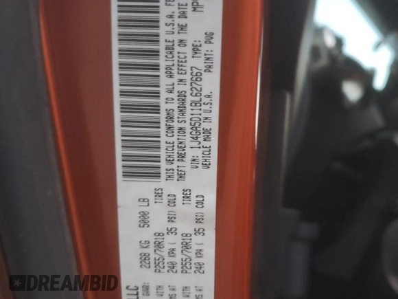 2011 Jeep Wrangler Sahara with VIN 1J4GA5D11BL627667, listed as a Copart auction lot 87227054 with 124,009 mi miles and Clean Title. Bid and sale history available at DreamBid. Image 14.