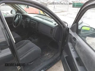 2004 Dodge Dakota Sport with VIN 1D7HL38N24S768283, listed as a IAAI auction lot 41635910 with 328,505 mi miles. Bid and sale history available at carsss.com. Image 5.