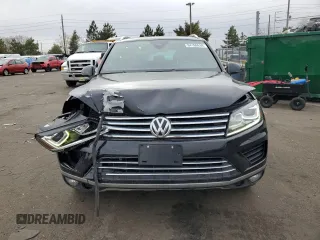 2017 Volkswagen Touareg Wolfsburg Edition with VIN WVGRF7BP9HD006520, listed as a Copart auction lot 84168634 with 76,596 mi miles and Salvage title. Bid and sale history available at DreamBid. Image 5.