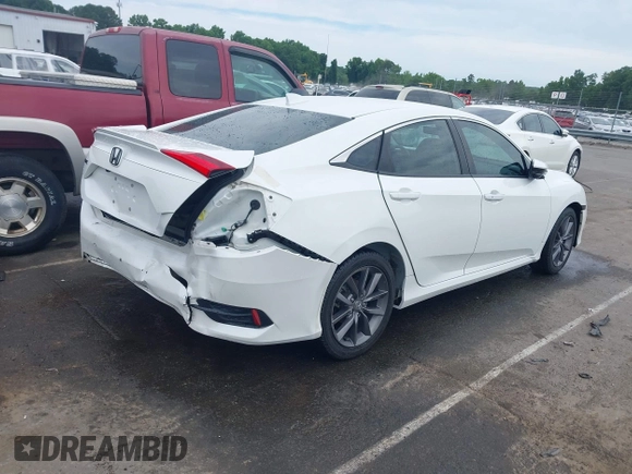 2020 Honda Civic EX-L z VIN 19XFC1F74LE015155, wystawiony jako IAAI lot #42286191 z przebiegiem 73 146 mil mil oraz . Historia ofert i sprzedaży dostępna na DreamBid. Obrazek 4.