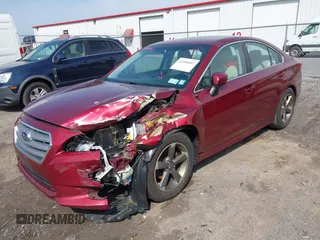 2015 Subaru Legacy Premium with VIN 4S3BNAC62F3040023, listed as a IAAI auction lot 42390097 with 143,257 mi miles and . Bid and sale history available at DreamBid. Image 2.