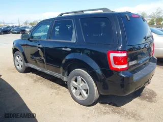 2010 Ford Escape XLT with VIN 1FMCU0DG6AKB52973, listed as a IAAI auction lot 41966024 with 137,774 mi miles. Bid and sale history available at carsss.com. Image 3.