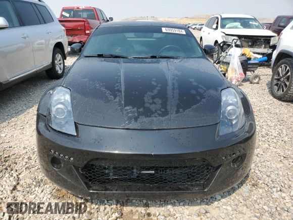 2004 Nissan 350Z Touring with VIN JN1AZ34DX4M100245, listed as a Copart auction lot 69959184 with 213,097 mi miles and Salvage Title. Bid and sale history available at carsss.com. Image 5.