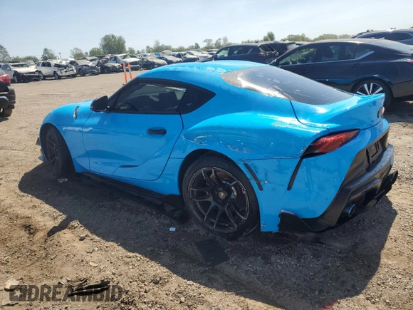 2021 Toyota Supra 2.0 with VIN WZ1DB2C04MW039858, listed as a Copart auction lot 70049874 with 10,586 mi miles and Salvage title. Bid and sale history available at DreamBid. Image 2.