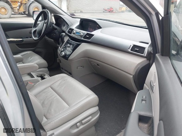 2011 Honda Odyssey EX-L with VIN 5FNRL5H65BB047291, listed as a IAAI auction lot 42094374 with 200,372 mi miles. Bid and sale history available at carsss.com. Image 5.