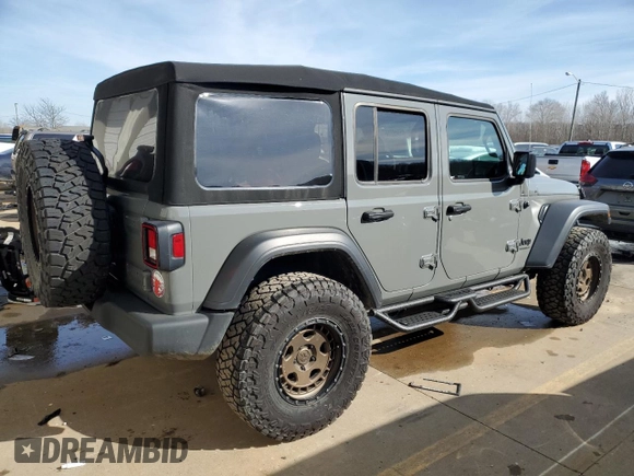 2023 Jeep Wrangler Sport S with VIN 1C4HJXDG8PW675134, listed as a Copart auction lot 85949314 with 19,128 mi miles and Salvage Title. Bid and sale history available at DreamBid. Image 3.
