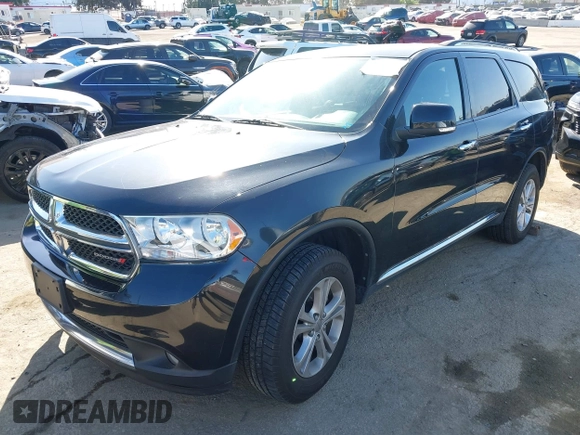 2013 Dodge Durango Crew with VIN 1C4RDHDG1DC666094, listed as a IAAI auction lot 41940121 with 93,131 mi miles and . Bid and sale history available at carsss.com. Image 2.