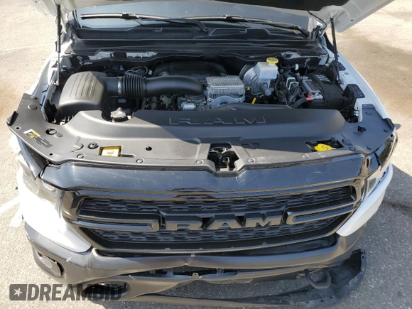 2023 Ram 1500 Tradesman with VIN 1C6SRFGT7PN684311, listed as a Copart auction lot 69792804 with 13,946 mi miles and Salvage title. Bid and sale history available at DreamBid. Image 12.