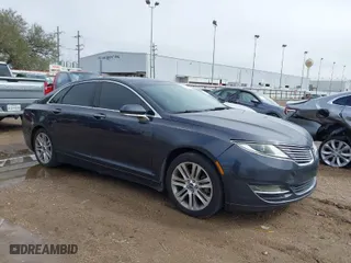 2014 Lincoln MKZ with VIN 3LN6L2G90ER829154, listed as a IAAI auction lot 41653378 with 199,363 mi miles. Bid and sale history available at carsss.com. Image 1.