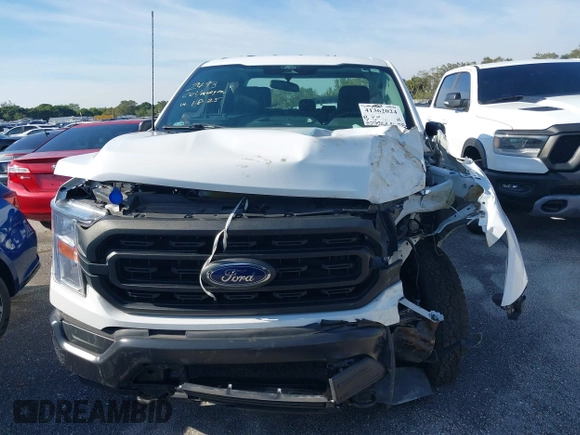 2022 Ford F-150 XL z VIN 1FTFX1E54NKD86627, wystawiony jako IAAI lot #41362024 z przebiegiem 32 712 mil mil oraz . Historia ofert i sprzedaży dostępna na DreamBid. Obrazek 12.