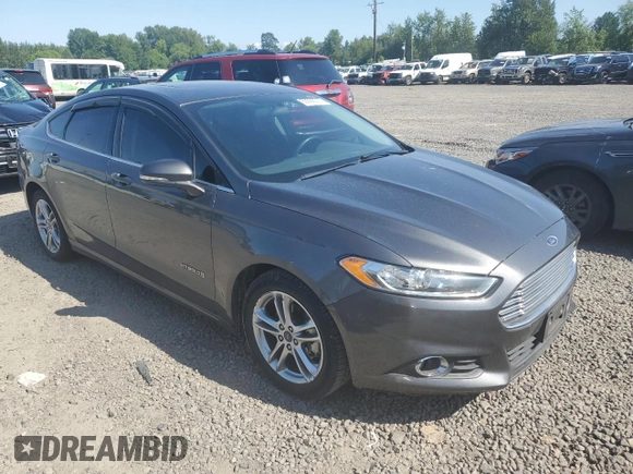 2016 Ford Fusion SE Hybrid z VIN 3FA6P0LU3GR173886, wystawiony jako Copart lot #60066015 z przebiegiem 140 328 mil mil oraz Szkoda całkowita • Salvage title. Historia ofert i sprzedaży dostępna na DreamBid. Obrazek 4.