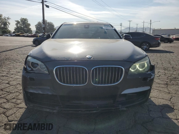 2014 BMW 7 Series 740Li with VIN WBAYE4C56ED138044, listed as a Copart auction lot 74859434 with 110,209 mi miles and Clean Title. Bid and sale history available at carsss.com. Image 5.