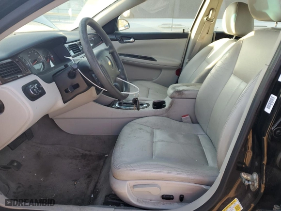 2015 Chevrolet Impala Limited LTZ with VIN 2G1WC5E30F1116872, listed as a Copart auction lot 77761004 with 152,633 mi miles and Salvage Title. Bid and sale history available at carsss.com. Image 7.