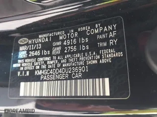 2013 Hyundai Genesis 3.8L with VIN KMHGC4DD4DU236901, listed as a IAAI auction lot 42093599 with 216,864 mi miles. Bid and sale history available at carsss.com. Image 9.