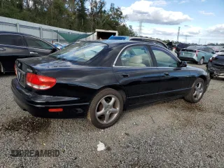 2002 Mazda Millenia z VIN JM1TA221421729790, wystawiony jako Copart lot #84460794 z przebiegiem 68 102 mil mil oraz Szkody całkowita. Historia ofert i sprzedaży dostępna na DreamBid. Obrazek 3.