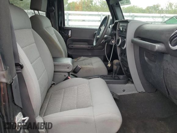 2009 Jeep Wrangler Sahara with VIN 1J4FA54109L702963, listed as a Copart auction lot 89211555 with 125,138 mi miles and Clean title. Bid and sale history available at DreamBid. Image 11.