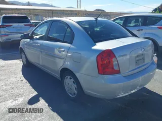 2006 Hyundai Accent GLS with VIN KMHCN46C16U023680, listed as a IAAI auction lot 41253207 with 157,398 mi miles. Bid and sale history available at carsss.com. Image 3.